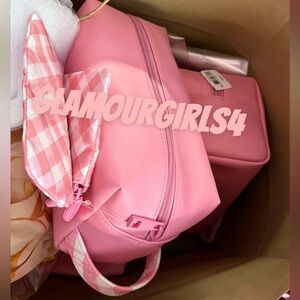 Pink cosmetic bag NWT with a couple small attachments for the smaller  itema.